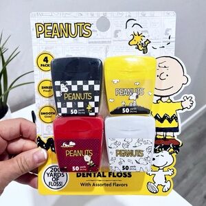 Peanuts Dental Floss 4-Pack — Black, Yellow, Red, White